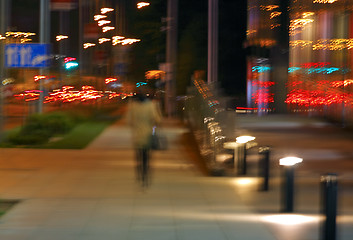 Image showing Abstract of woman walking in city at night