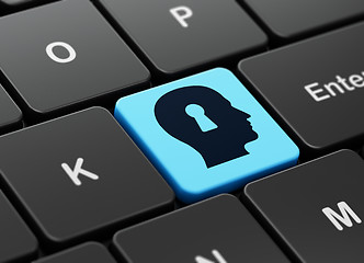 Image showing Information concept: Head With Keyhole on computer keyboard background