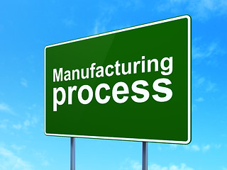 Image showing Manufacuring concept: Manufacturing Process on road sign background