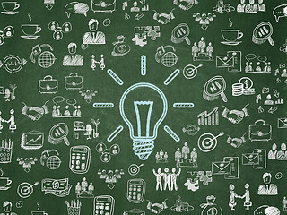 Image showing Finance concept: Light Bulb on School board background