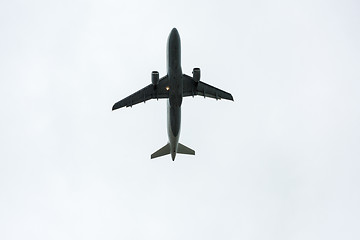 Image showing Airplane taking off during rain