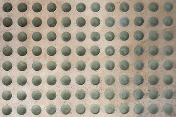 Image showing Concrete floor with round glass inlets