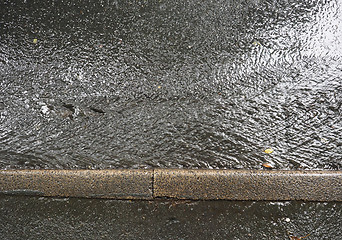 Image showing Pouring rain water