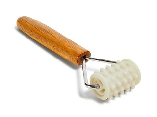 Image showing Wooden massager on white