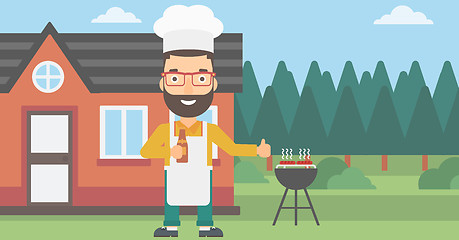 Image showing Man preparing barbecue.