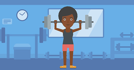 Image showing Woman lifting barbell.