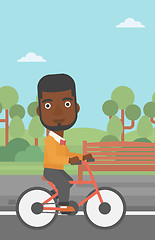 Image showing Man riding bicycle.