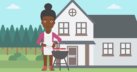 Image showing Woman preparing barbecue.