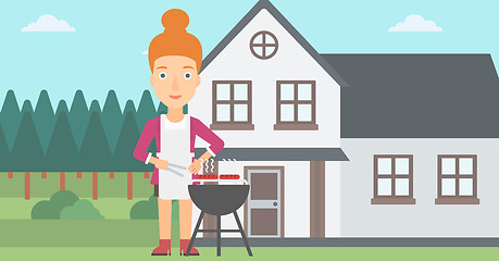 Image showing Woman preparing barbecue.