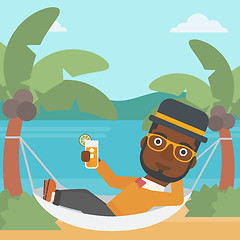 Image showing Man chilling in hammock.