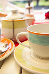 Image showing Black fruit tea is brewed in a teapot