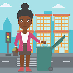 Image showing Woman throwing trash.