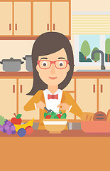 Image showing Woman cooking vegetable salad.