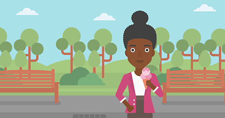 Image showing Woman holding icecream.