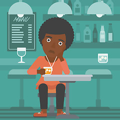 Image showing Woman sitting at bar.