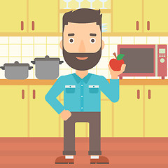 Image showing Man holding apple.