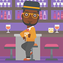 Image showing Man sitting at bar.