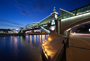Image showing Night landscape with the illuminated bridge and river. Moscow, R