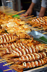 Image showing Grilled squids on stick 