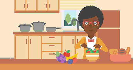 Image showing Woman cooking vegetable salad.