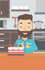 Image showing Man looking at cake.