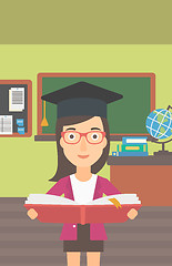 Image showing Woman in graduation cap holding book.