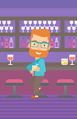 Image showing Man sitting at bar.