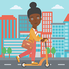 Image showing Woman riding on scooter.