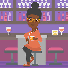 Image showing Woman sitting at bar.