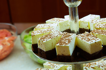 Image showing Dessert table for party. akes and sweetness. Shallow dof