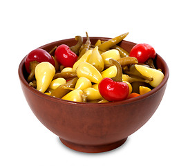 Image showing Mix of hot turkish marinated peppers in ceramic bowl