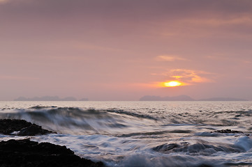 Image showing The sunset over the sea with waves