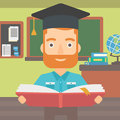 Image showing Man in graduation cap holding book.