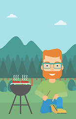 Image showing Man preparing barbecue.