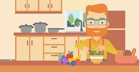 Image showing Man cooking vegetable salad.