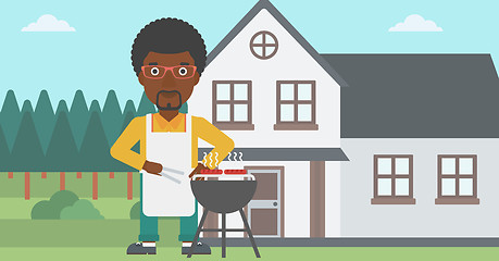 Image showing Man preparing barbecue.