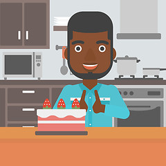 Image showing Man looking at cake.