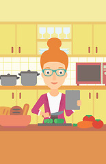 Image showing Woman cooking meal.