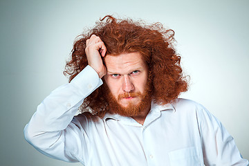 Image showing Stressed businessman with a headache