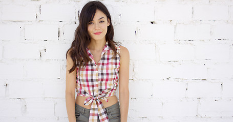 Image showing Attractive woman with checkered top and shorts