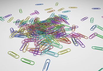 Image showing many color paperclips on desk