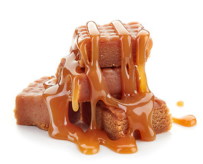 Image showing caramel candies and sauce