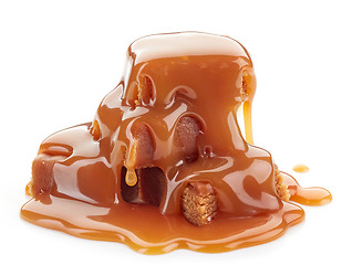 Image showing caramel candies and sauce