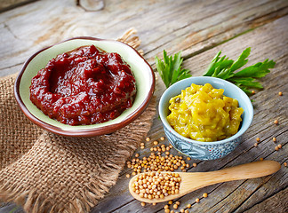 Image showing various dip sauces on wooden table