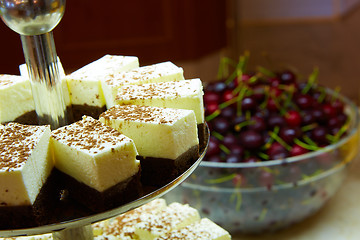 Image showing Dessert table for party. akes and sweetness. Shallow dof