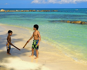 Image showing Boys on the beach