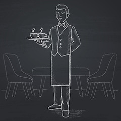 Image showing Waiter holding tray with beverages.