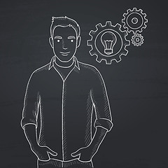 Image showing Man with bulb and gears.