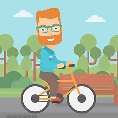 Image showing Man riding bicycle.