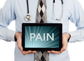 Image showing Doctor holding tablet - Pain